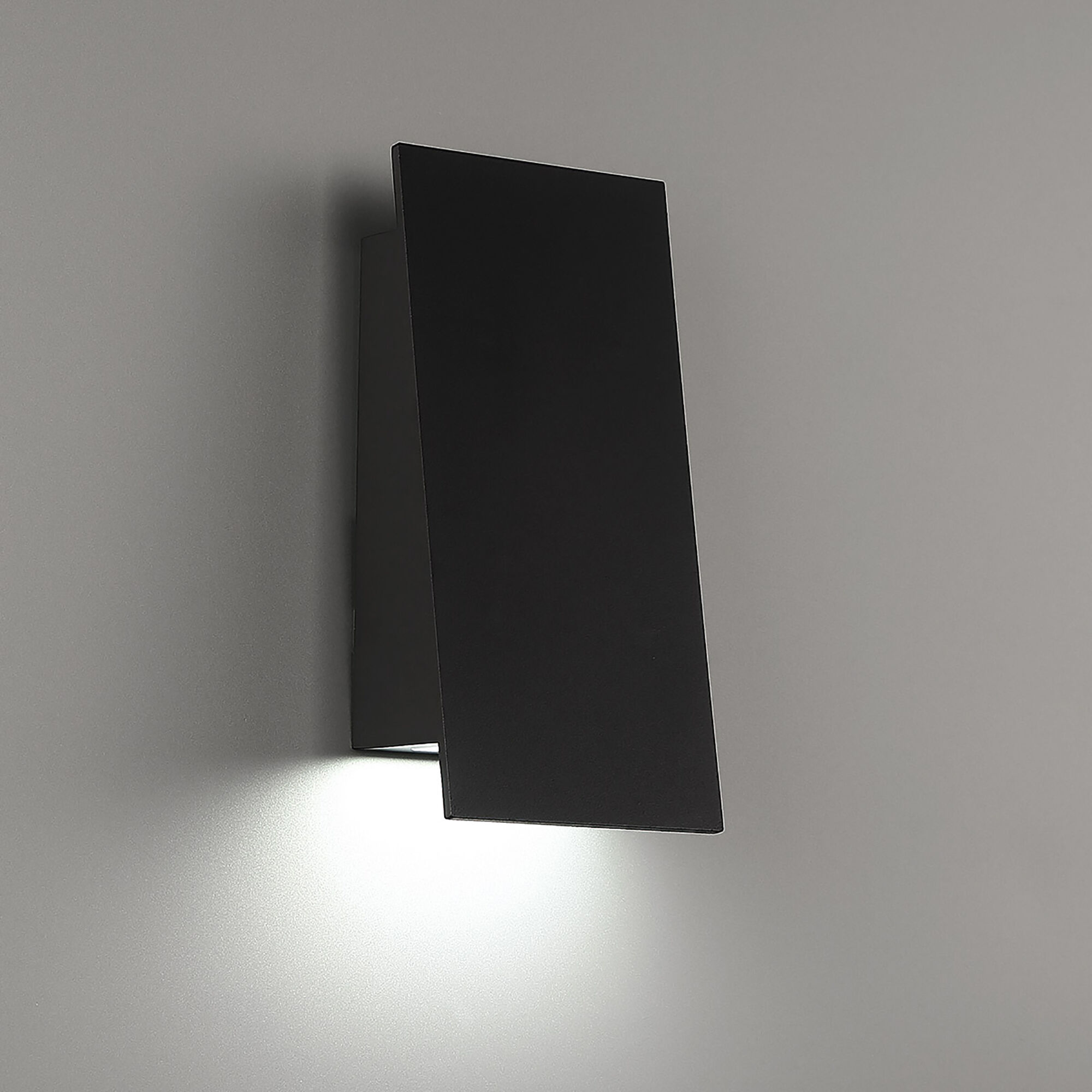 Angled outdoor wall light outlet